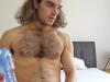 Long-haired-young-Aussie-stud-Reece-Anderson-strips-naked-outdoors-stroking-huge-uncut-cock-33-gay-porn-pics