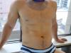 Hot-young-Aussie-boy-Matthew-Attard-strips-off-naked-Speedos-stroking-thick-erect-uncut-dick-2-gay-porn-pics