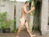 Bearded-wrestler-Ian-strips-naked-stroking-huge-9-inch-dick-outdoors-spraying-jizz-all-over-himself-17-gay-porn-pics