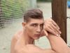 Goodlooking-ripped-young-stud-Maori-Mortensen-strips-red-shorts-stroking-huge-uncut-cock-016-gay-porn-pics