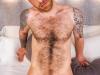 Hairy-tattooed-Portuguese-ex-professional-football-player-Serkan-Bolat-strips-naked-stroking-huge-uncut-dick-10-gay-porn-pics