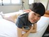 Sexy-young-Australian-Asian-stud-Andrew-Tran-strips-down-to-socks-sneakers-stroking-young-twink-uncut-dick-5-gay-porn-pics